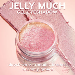 Open jar of ColourPop Jelly Much Shadow, No Rest For The Vivid, showcasing a pink-to-gold duochrome metallic gel eyeshadow, with bold swatches sweeping across a blush background, highlighting vibrant pigment and creamy texture.
