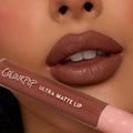 Full lips showcase Espresso Martini, a rich mocha-brown shade with a soft, diffused matte finish, while a ColourPop tube rests below; ColourPop Ultra Blotted Lip delivers lightweight, blurred color for everyday wear.