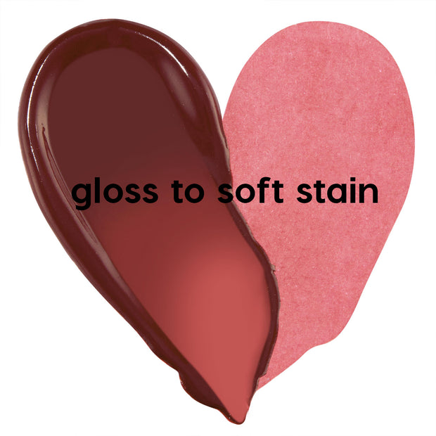 Heart-shaped swatch of ColourPop Lip Stain 90s Babe showing finishes: left side a glossy deep berry labeled “gloss it,” right side a sheer matte rose stain labeled “stain it,” demonstrating buildable color payoff on a white background.