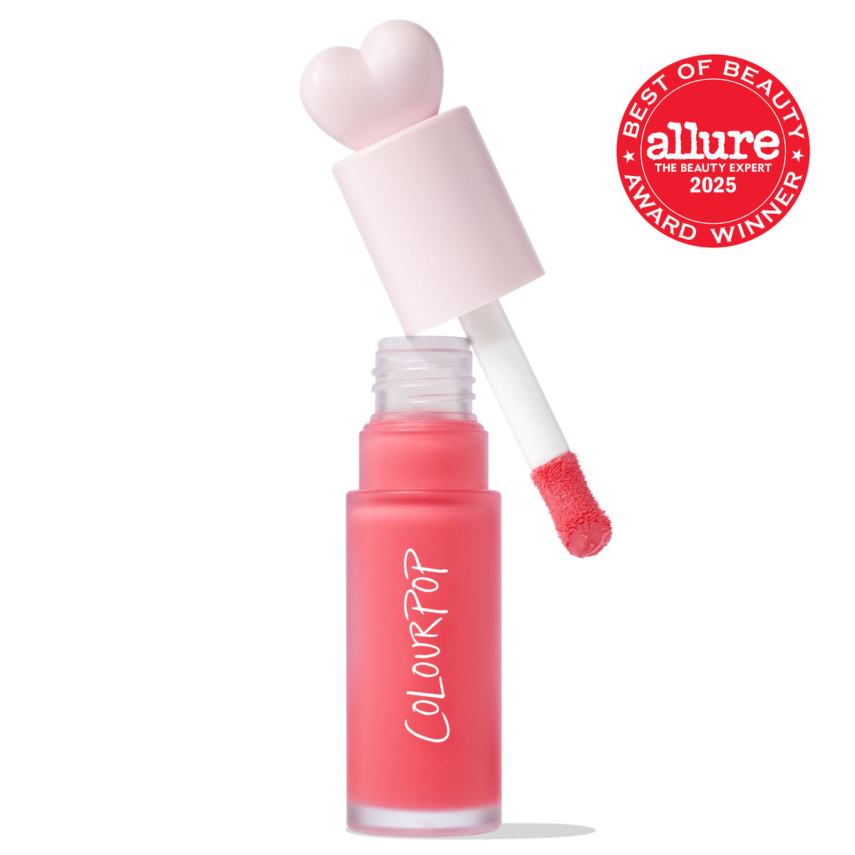 ColourPop Liquid Blush Angel Face shown with doe-foot applicator lifted from a frosted coral-pink bottle, heart-shaped pastel cap, and Allure Best of Beauty 2025 award badge on a white background.