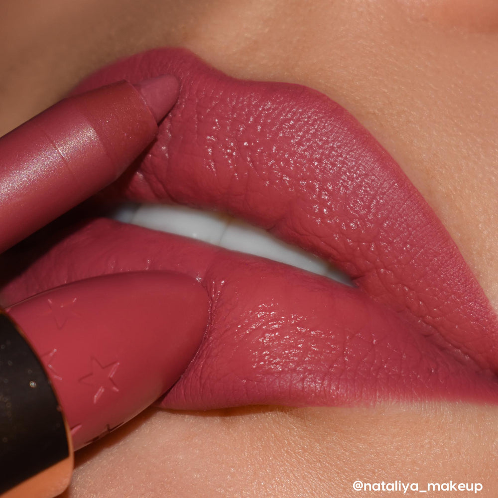 ColourPop Lippie Pencil Shot Clock lines and defines full lips in a creamy matte mauve‑pink, paired with a matching star‑embossed Lux Lipstick bullet in a tight studio close‑up beauty shot.