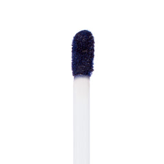 Doe-foot applicator coated in Panther, a deep midnight navy ColourPop Ultra Matte Lip, showcasing the velvety matte formula on a white wand against a clean white background.