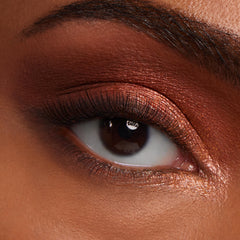 Rose-gold metallic eyeshadow blended across the lid with copper shimmer and an inner-corner highlight, lashes softly defined - showcasing Metallic Mood ColourPop Shadow Palette & Brush Set in a macro close-up beauty shot.