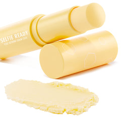Selfie Ready pore-refining serum stick opened with twist-up balm extended, creamy pale-yellow swatch below; matte pastel-yellow tube with white geometric accents on a clean white backdrop, highlighting the ColourPop Serum Stick.