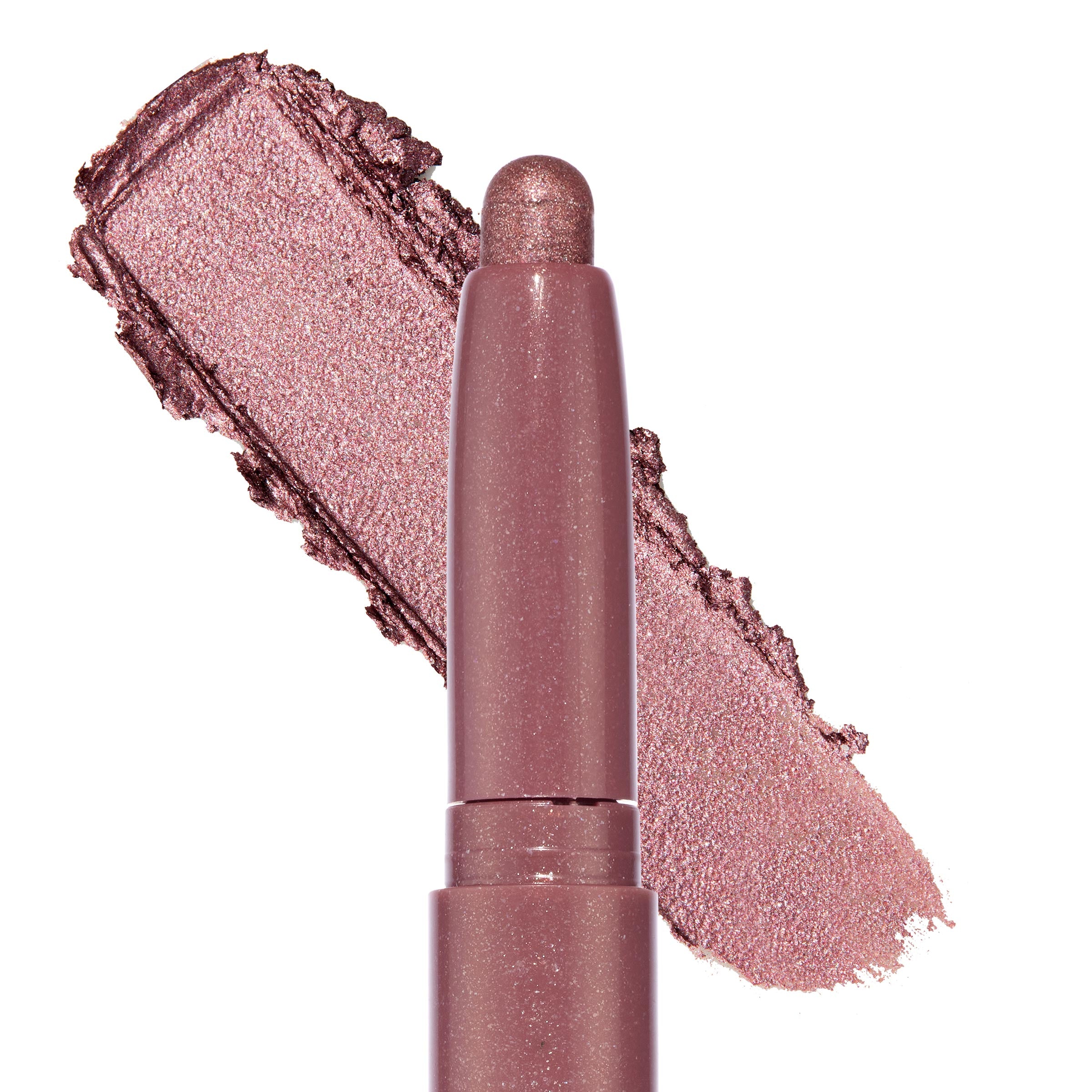 Next Spot ColourPop Shadow Stix glides a metallic rosy‑mauve shimmer, shown as a twist‑up cream eyeshadow stick with a bold swatch behind on a white background.