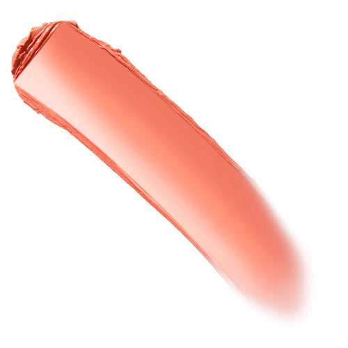 Peachy-coral cream blush swatch sweeping in one smooth stroke on a white background, revealing a dewy, blendable sheen - Under Pressure Blush Stix by ColourPop, a ColourPop Blush Stix shade for buildable cheek color.