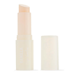 ColourPop Vanilla lip balm stick uncapped, creamy beige bullet twisted up beside a frosted translucent cap with delicate floral icons on a white studio background.