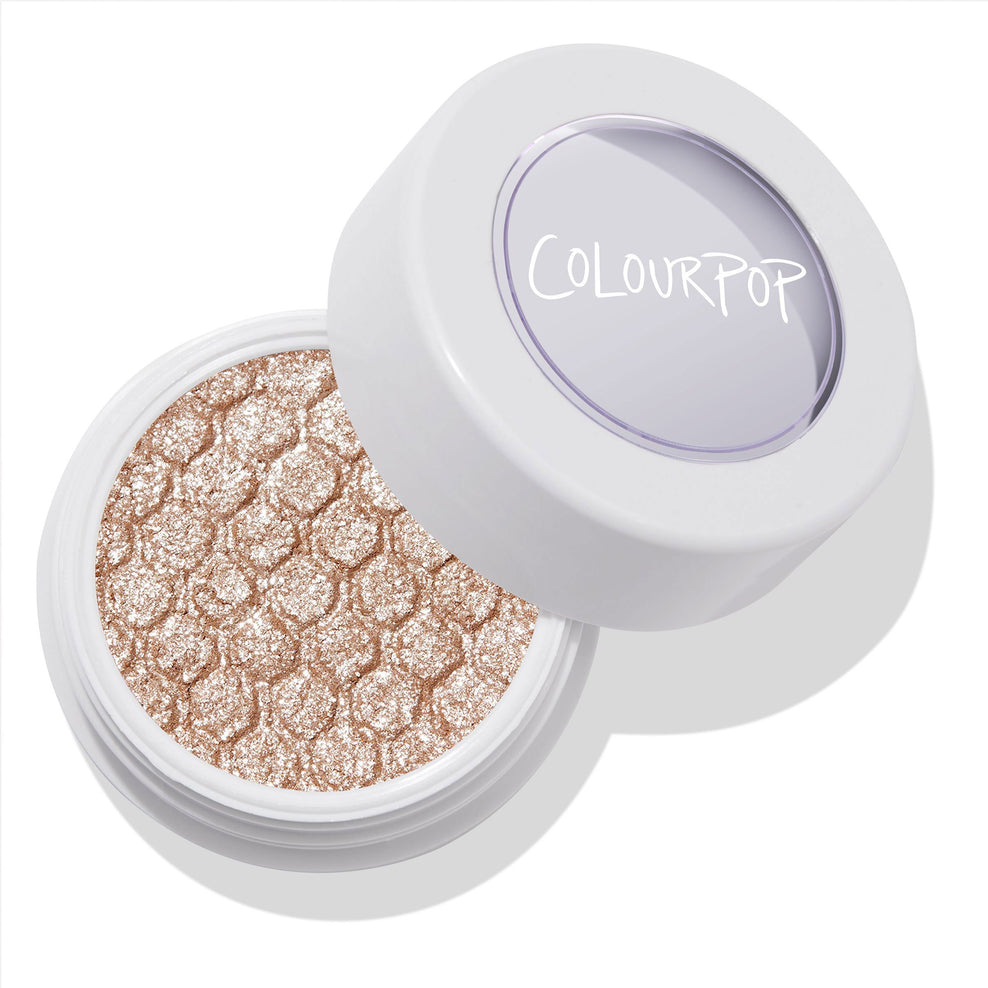 Colourpop super shock shadow in Ritz a Sheer nude with silver glitter.