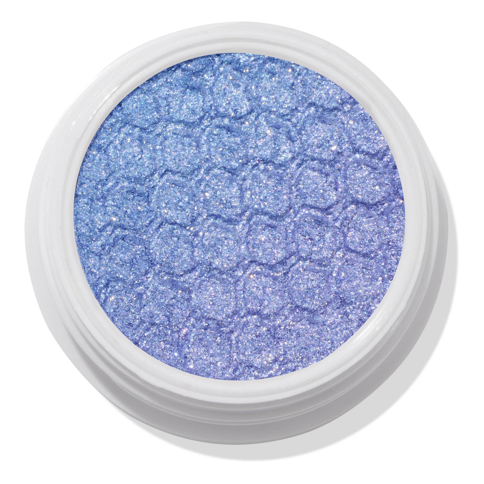 Colourpop super shock shadow in REM a Periwinkle blue with lavender and silver glitter.