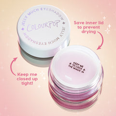Open jar of ColourPop Jelly Much Shadow, Boo-Kay, revealing lilac jelly pigment and a protective inner lid while the white screw cap rests nearby, showing to keep lids tight to prevent drying, on a pink sparkly gradient background.