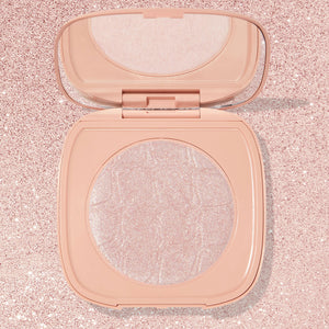 Soft Pink icy pink with gold pinpoints SOL Face & Body Highlighter compact with mirror
