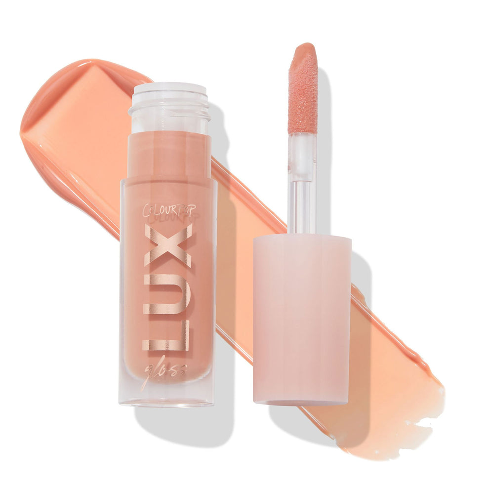 Just Cuddle lux liquid gloss , pale peachy nude shade swatch