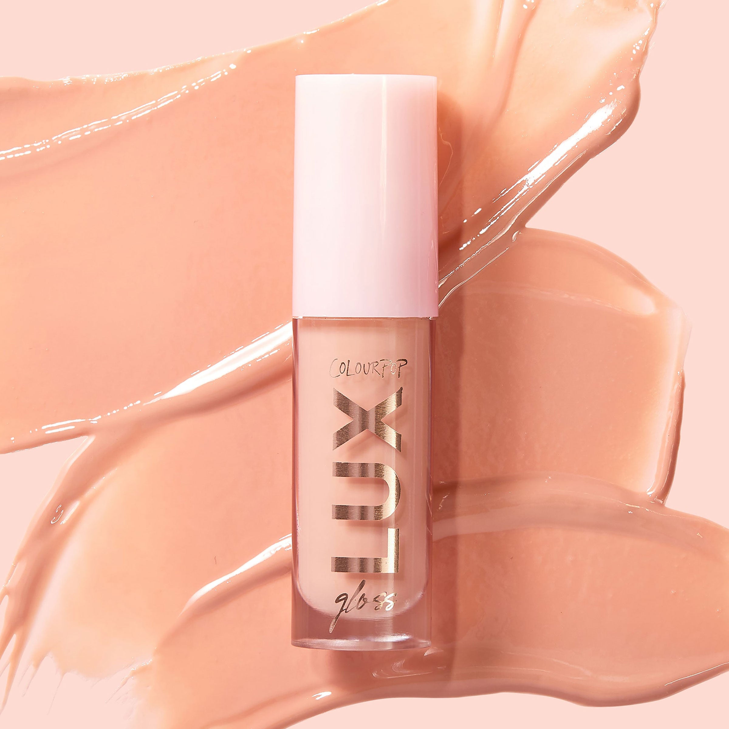 Just Cuddle lux liquid gloss , pale peachy nude shade with crème finish