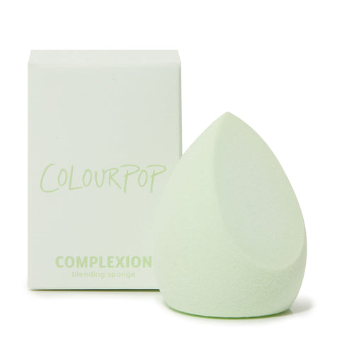 Complexion Blending Sponge next to its unit carton 