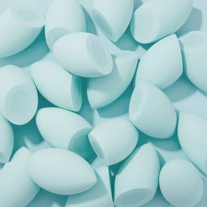 Bundle of Silicone Blending Sponges in a baby blue background