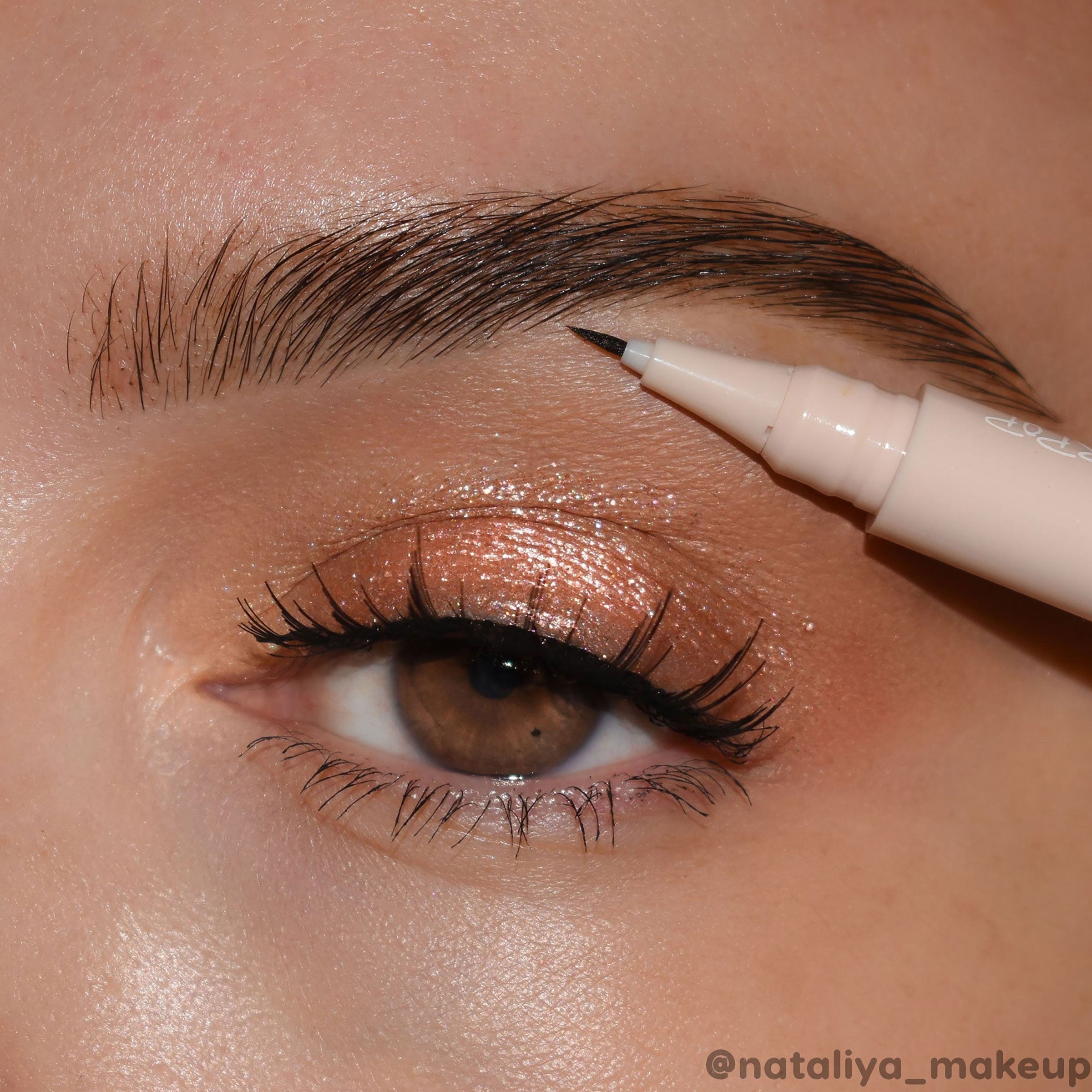 ColourPop Feather Effect brow pen in light brown on model