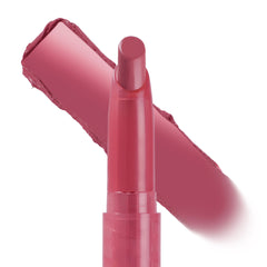Byron Babe ColourPop Lippie Stix showcasing its twist-up bullet in a creamy dusty-rose hue, with a thick swipe of matching color behind it on a white background.