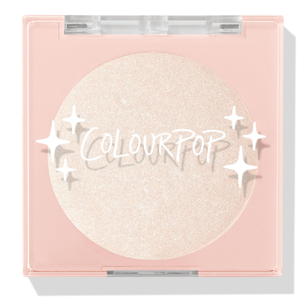 Cold One highlighter compact showcasing a shimmering icy pearl pan behind a clear lid with white sparkle icons and ColourPop logo, closed in a blush‑pink square case on a white background; ColourPop Pressed Powder Highlighter.